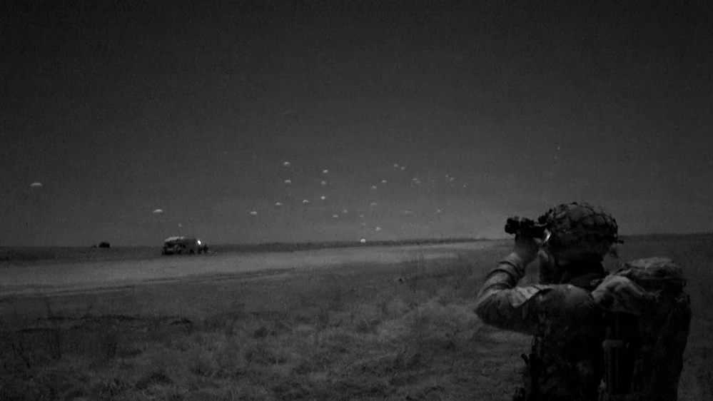 Paratroopers assigned to 3rd Brigade Combat Team, 82nd Airborne Division assault an objective after a joint forcible entry during Panther Avalanche at Fort Bragg, North Carolina, Jan. 28, 2026.