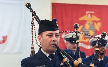 Coastguardsman Plays Bagpipes at 46th Coast Guard Cutter Blackthorn Memorial