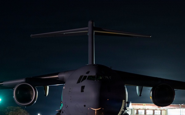 The 14th Airlift Squadron conducts a nighttime dissimular formation flight during Exercise Palmetto Reach