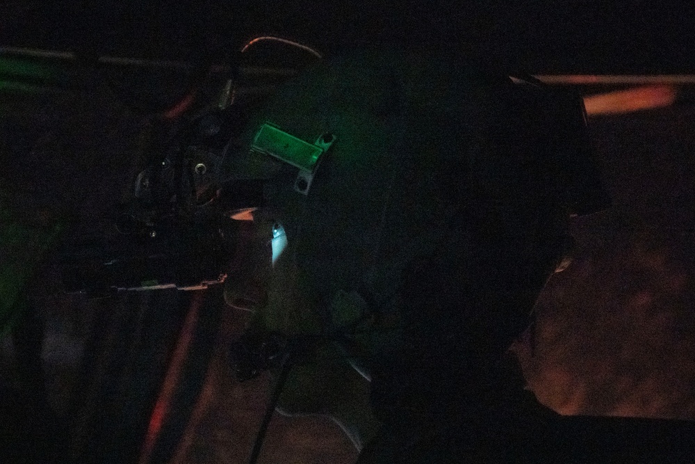 The 14th Airlift Squadron conducts a nighttime dissimular formation flight during Exercise Palmetto Reach