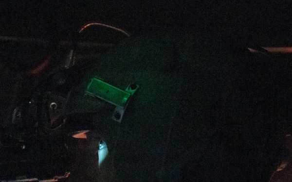 The 14th Airlift Squadron conducts a nighttime dissimular formation flight during Exercise Palmetto Reach