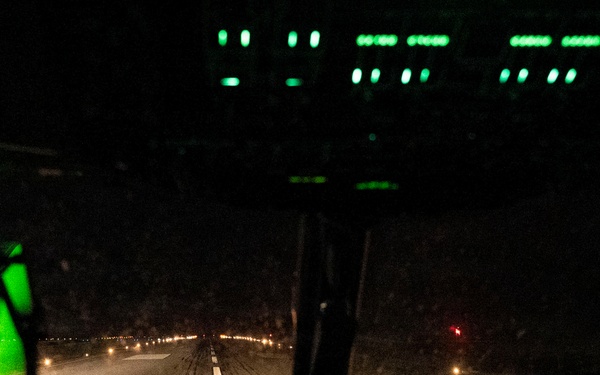The 14th Airlift Squadron conducts a nighttime dissimular formation flight during Exercise Palmetto Reach
