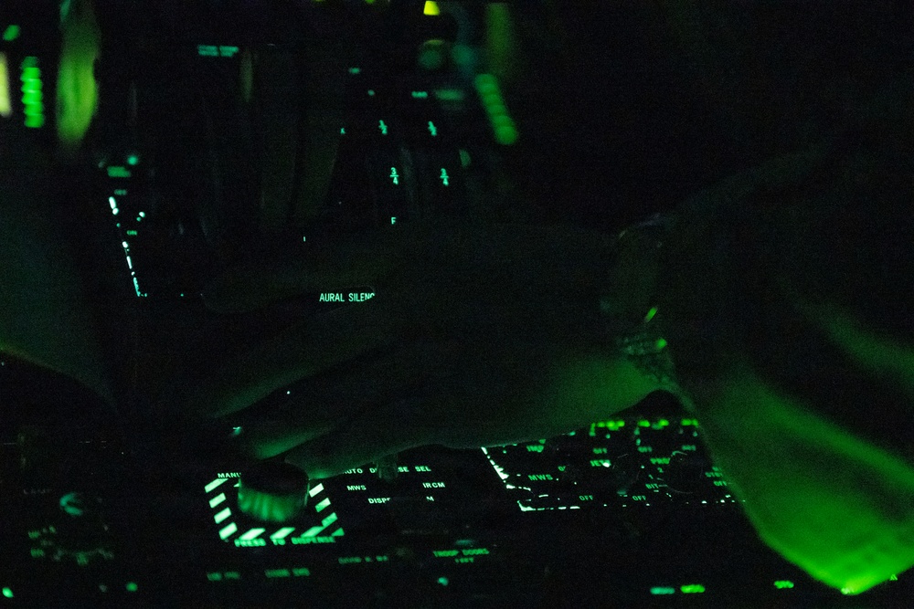 The 14th Airlift Squadron conducts a nighttime dissimular formation flight during Exercise Palmetto Reach