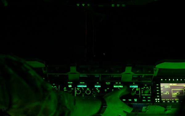 The 14th Airlift Squadron conducts a nighttime dissimular formation flight during Exercise Palmetto Reach