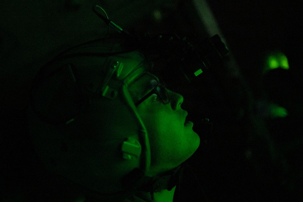 The 14th Airlift Squadron conducts a nighttime dissimular formation flight during Exercise Palmetto Reach