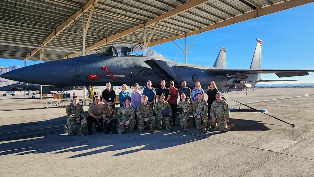 Members of RSO, Google and 57th Aircraft Maintenance Unit celebrate digital maintenance binder demo event