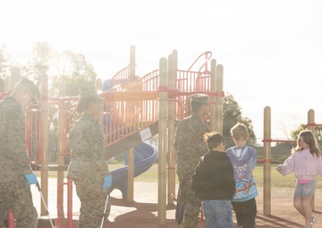 Marines and Sailors with MWHS-3 conduct a Campus clean-up at Doris Miller Elementary School
