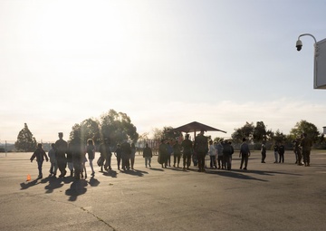 Marines and Sailors with MWHS-3 conduct a Campus clean-up at Doris Miller Elementary School