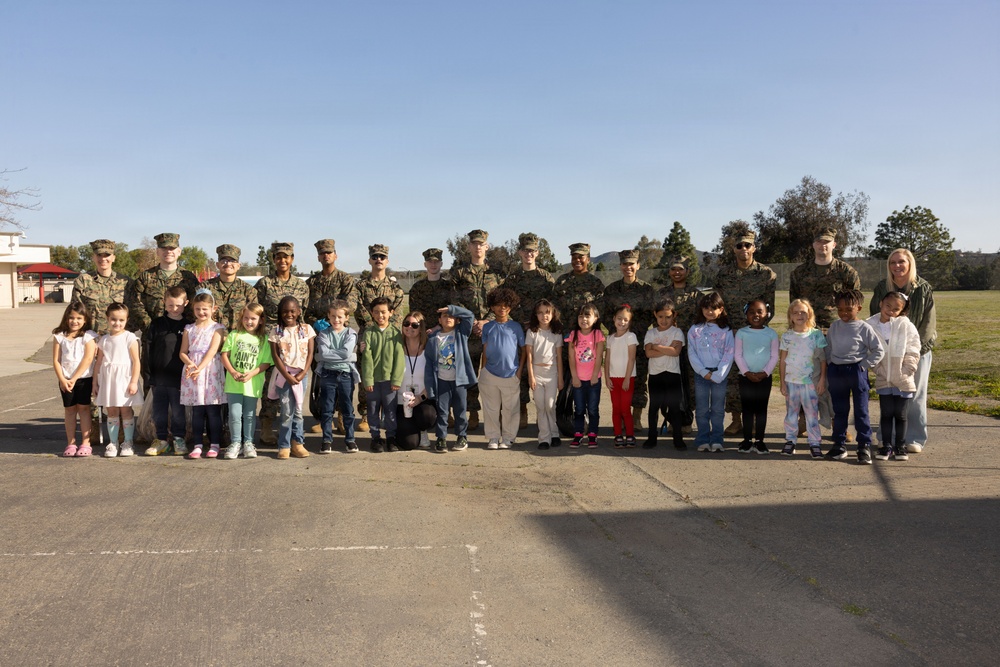 Marines and Sailors with MWHS-3 conduct a Campus clean-up at Doris Miller Elementary School