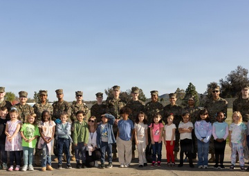 Marines and Sailors with MWHS-3 conduct a Campus clean-up at Doris Miller Elementary School