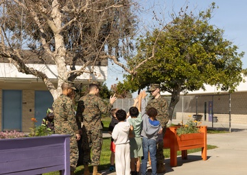 Marines and Sailors with MWHS-3 conduct a Campus clean-up at Doris Miller Elementary School