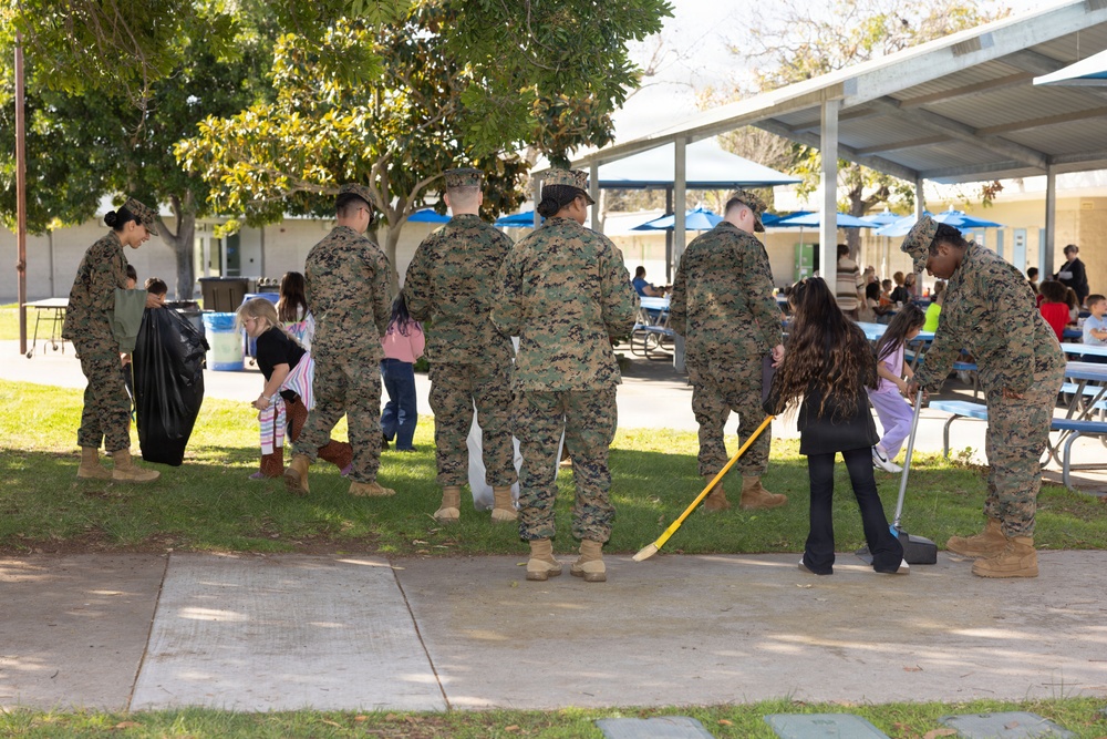 Marines and Sailors with MWHS-3 conduct a Campus clean-up at Doris Miller Elementary School