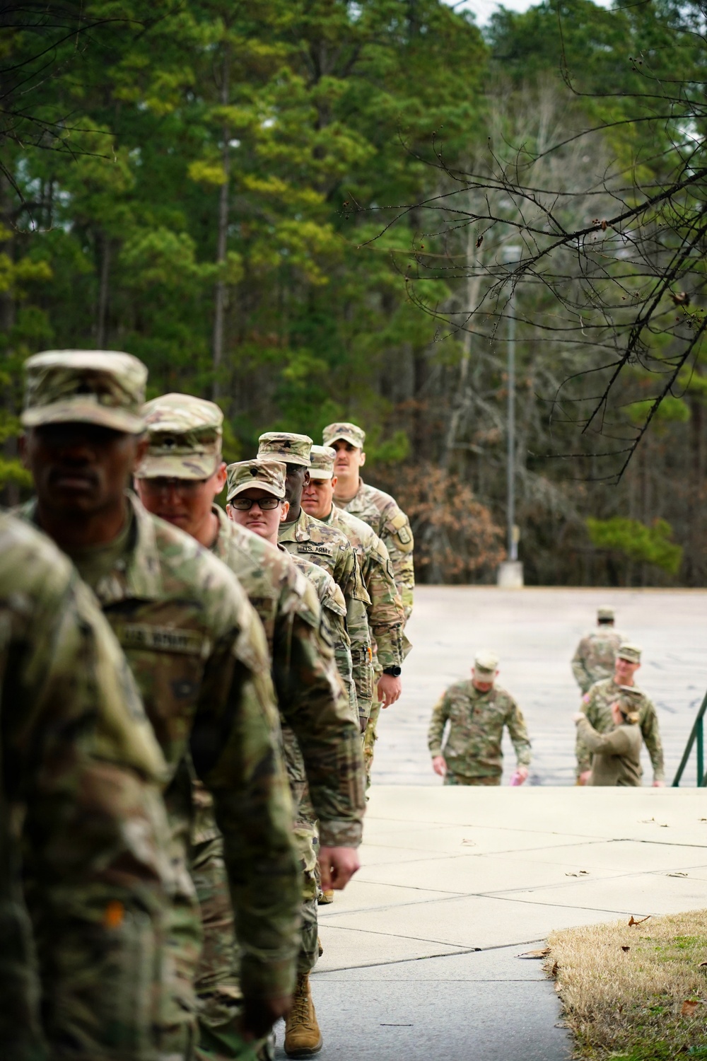 U.S. Army Soldiers and National Guardsman prepare to draw equipment