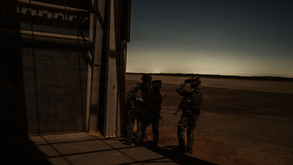 Paratroopers assigned to 3rd Brigade Combat Team, 82nd Airborne Division seize an objective during Panther Avalanche at Fort Bragg, North Carolina, Jan. 28, 2026.