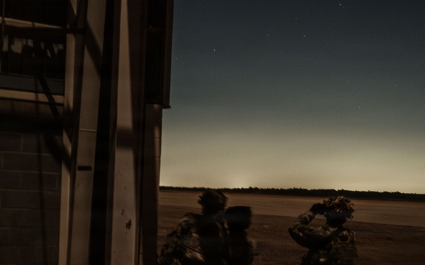 Paratroopers assigned to 3rd Brigade Combat Team, 82nd Airborne Division seize an objective during Panther Avalanche at Fort Bragg, North Carolina, Jan. 28, 2026.