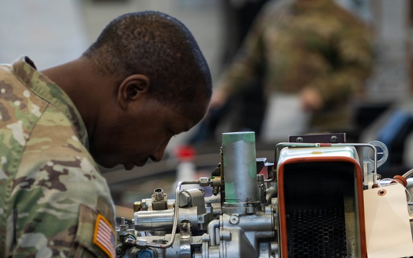12th CAB Soldiers perform 500-hour phase maintenance on AH-64E Apache