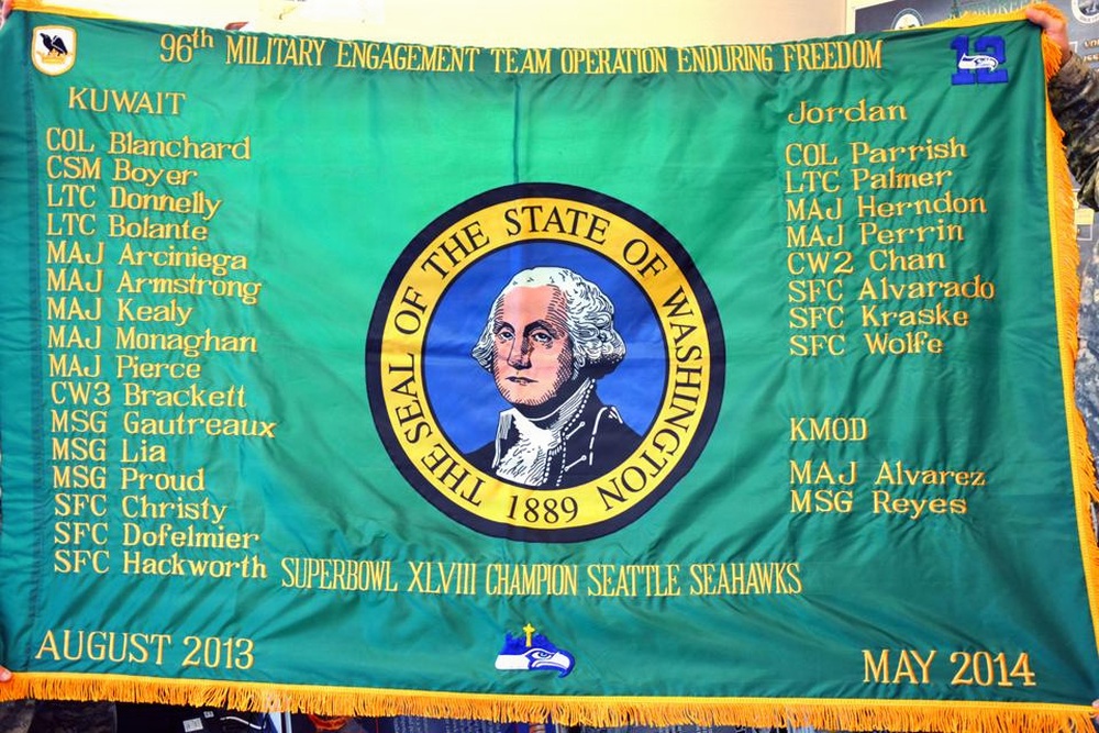 Seahawks flag flown in Kuwait to be donated to WA National Guard Museum