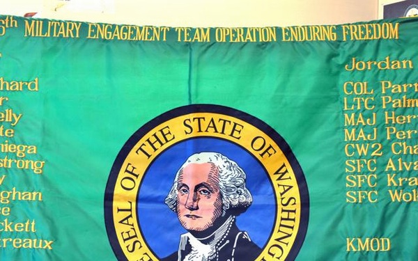Seahawks flag flown in Kuwait to be donated to WA National Guard Museum