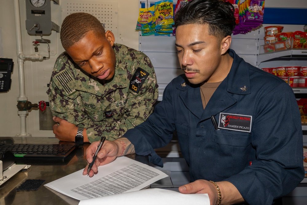 Retail Service Specialists perform end of month inventory aboard USS Bulkeley (DDG 84)