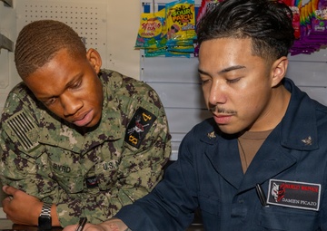 Retail Service Specialists perform end of month inventory aboard USS Bulkeley (DDG 84)
