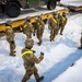 Soldiers load freight in preparation for JPMRC 26-02