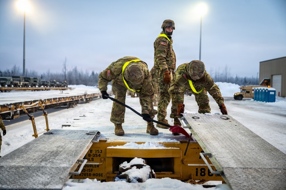 Soldiers load freight in preparation for JPMRC 26-02