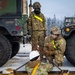 Soldiers load freight in preparation for JPMRC 26-02