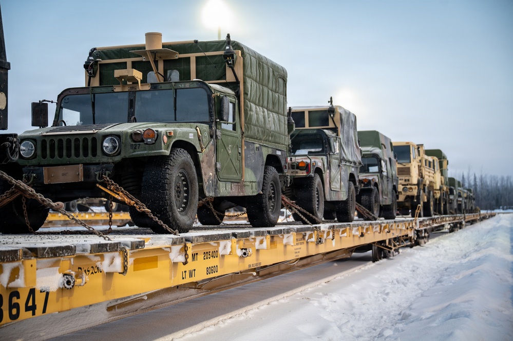 Soldiers load freight in preparation for JPMRC 26-02