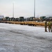 Soldiers load freight in preparation for JPMRC 26-02