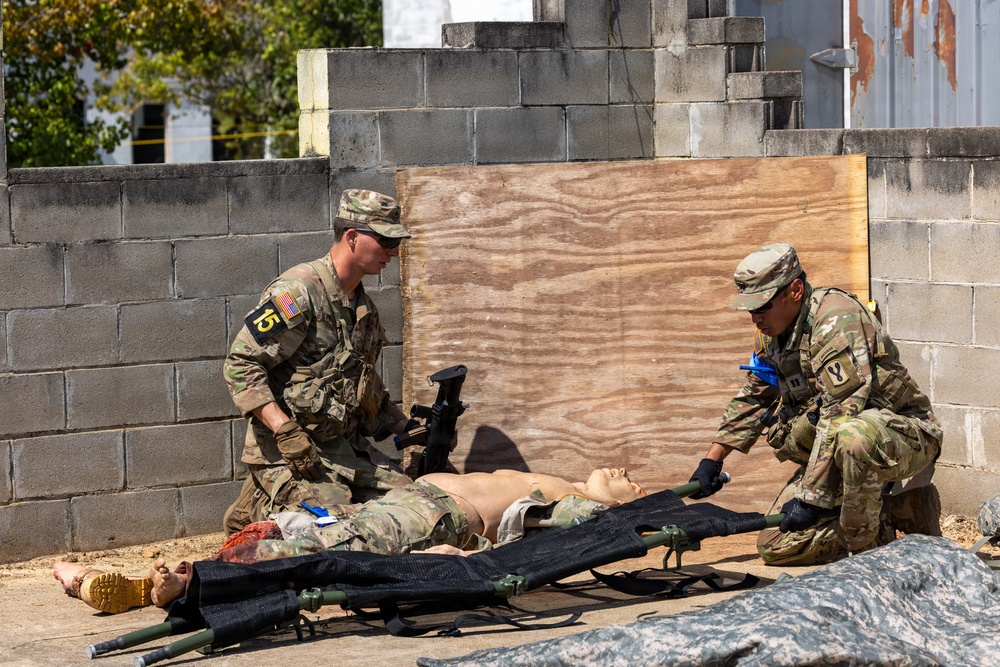 OC/Ts Prepare to Load Simulated Casualty onto Litter