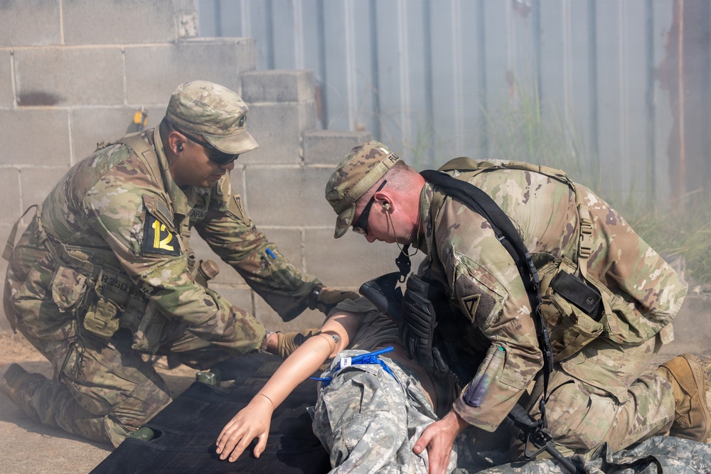 OC/Ts Load Simulated Casualty onto Litter