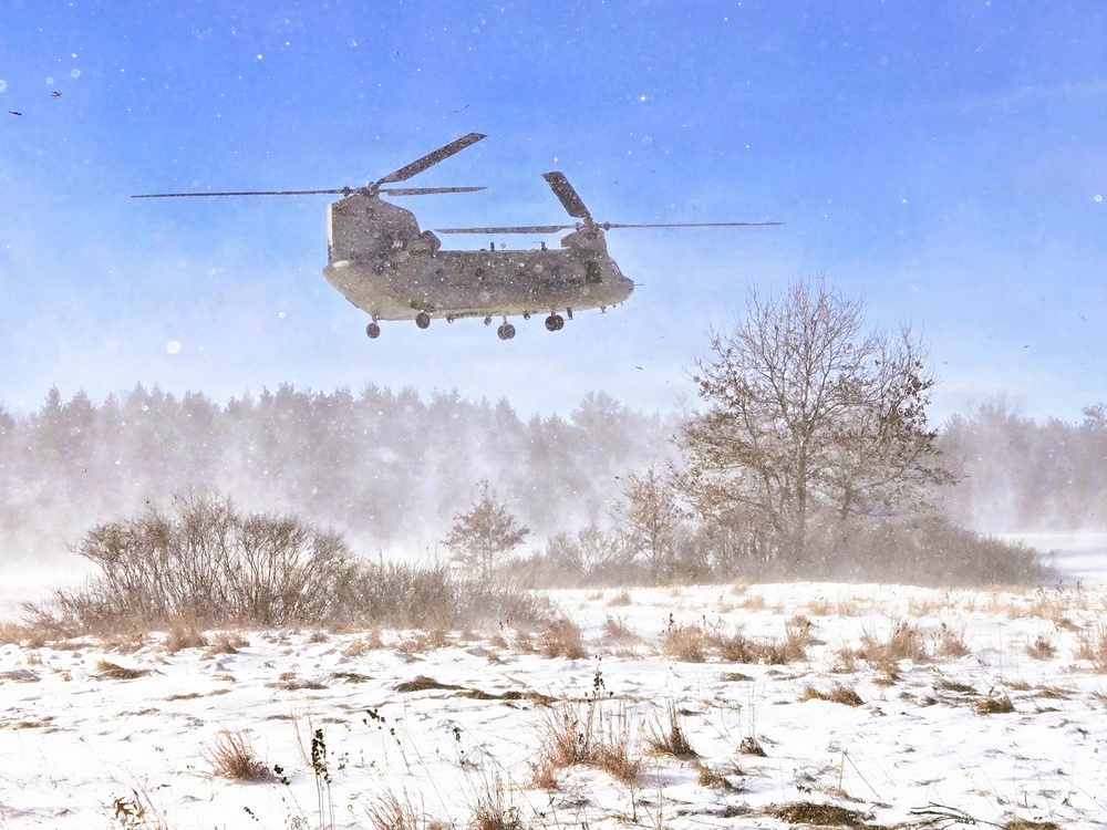 120th Field Artillery Soldiers conduct winter sling-load ops with Black Hawk, Chinook helicopters