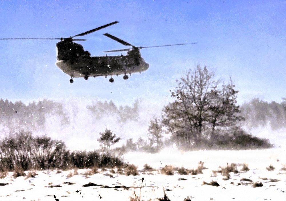 120th Field Artillery Soldiers conduct winter sling-load ops with Black Hawk, Chinook helicopters