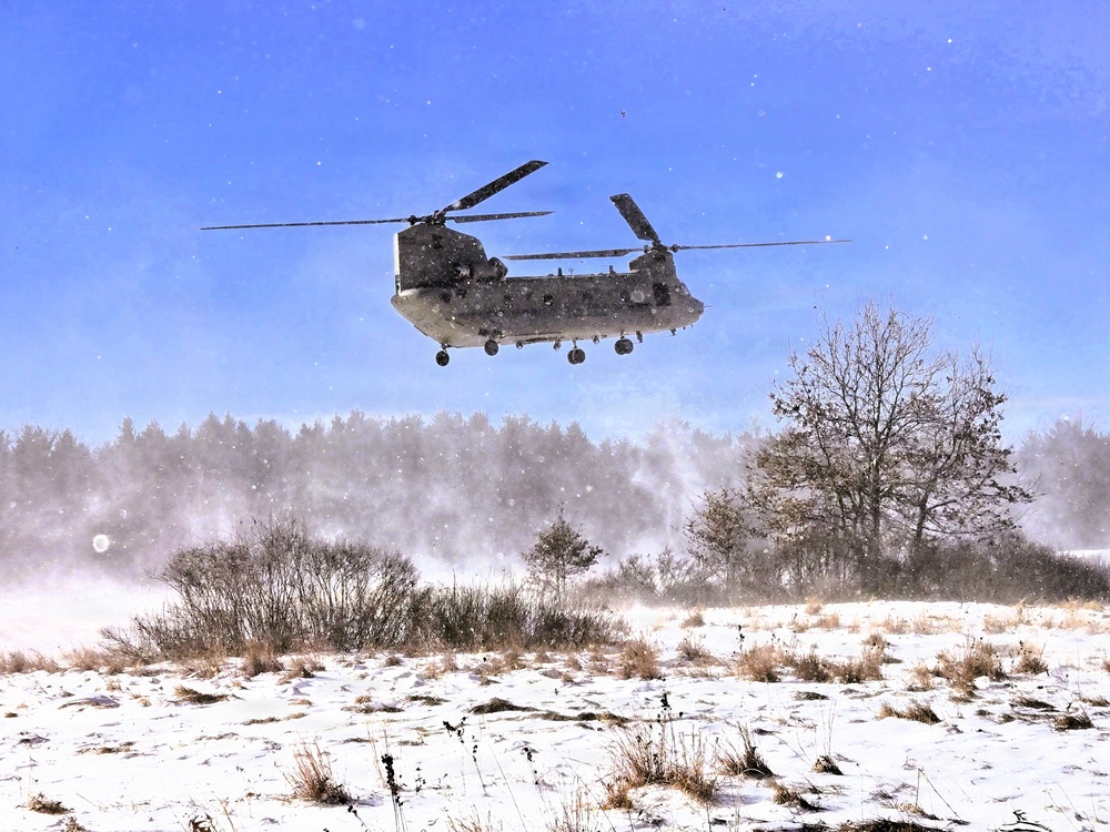 120th Field Artillery Soldiers conduct winter sling-load ops with Black Hawk, Chinook helicopters