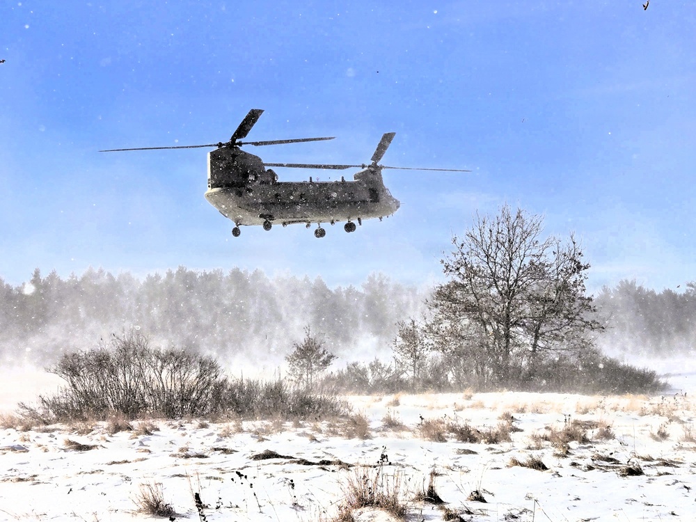 120th Field Artillery Soldiers conduct winter sling-load ops with Black Hawk, Chinook helicopters