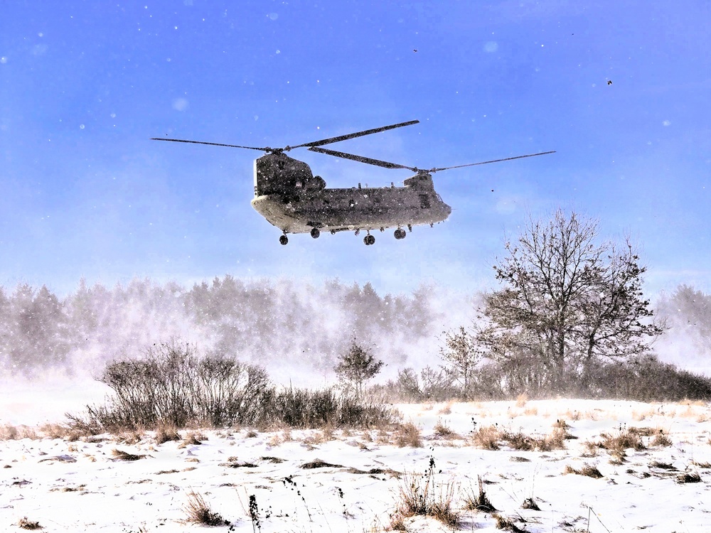 120th Field Artillery Soldiers conduct winter sling-load ops with Black Hawk, Chinook helicopters