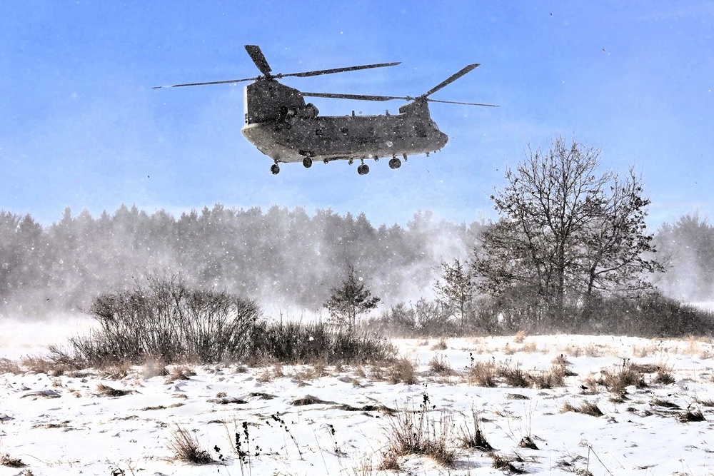 120th Field Artillery Soldiers conduct winter sling-load ops with Black Hawk, Chinook helicopters