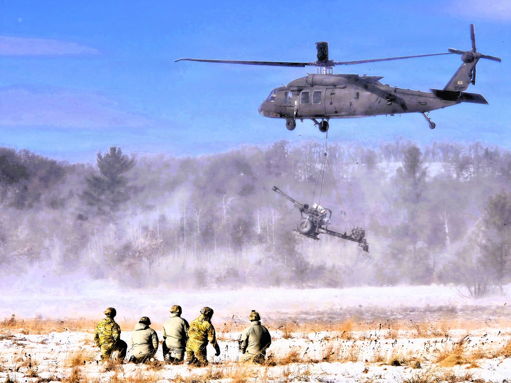 120th Field Artillery Soldiers conduct winter sling-load ops with Black Hawk, Chinook helicopters