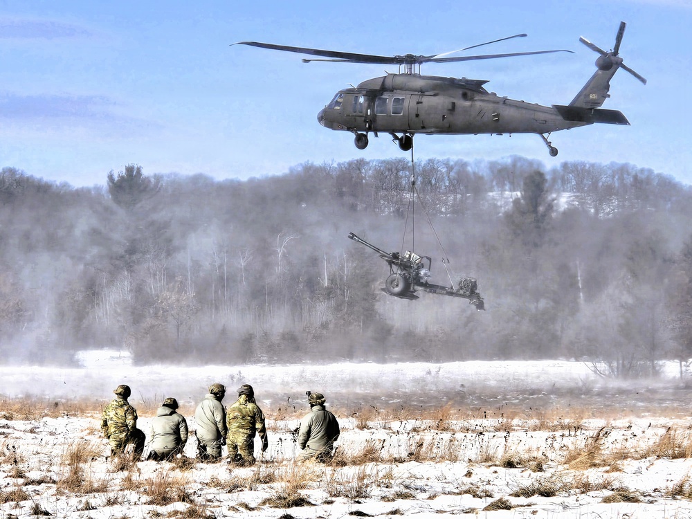 120th Field Artillery Soldiers conduct winter sling-load ops with Black Hawk, Chinook helicopters