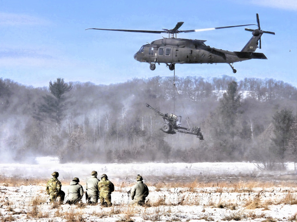 120th Field Artillery Soldiers conduct winter sling-load ops with Black Hawk, Chinook helicopters