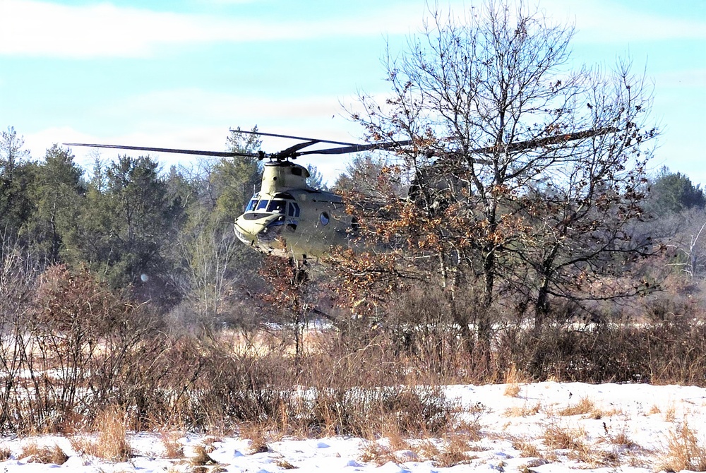 120th Field Artillery Soldiers conduct winter sling-load ops with Black Hawk, Chinook helicopters