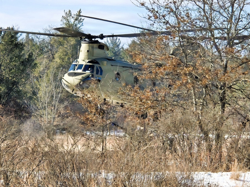 120th Field Artillery Soldiers conduct winter sling-load ops with Black Hawk, Chinook helicopters