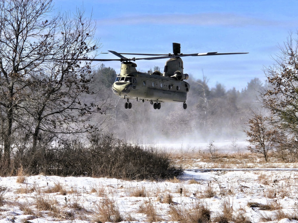 120th Field Artillery Soldiers conduct winter sling-load ops with Black Hawk, Chinook helicopters