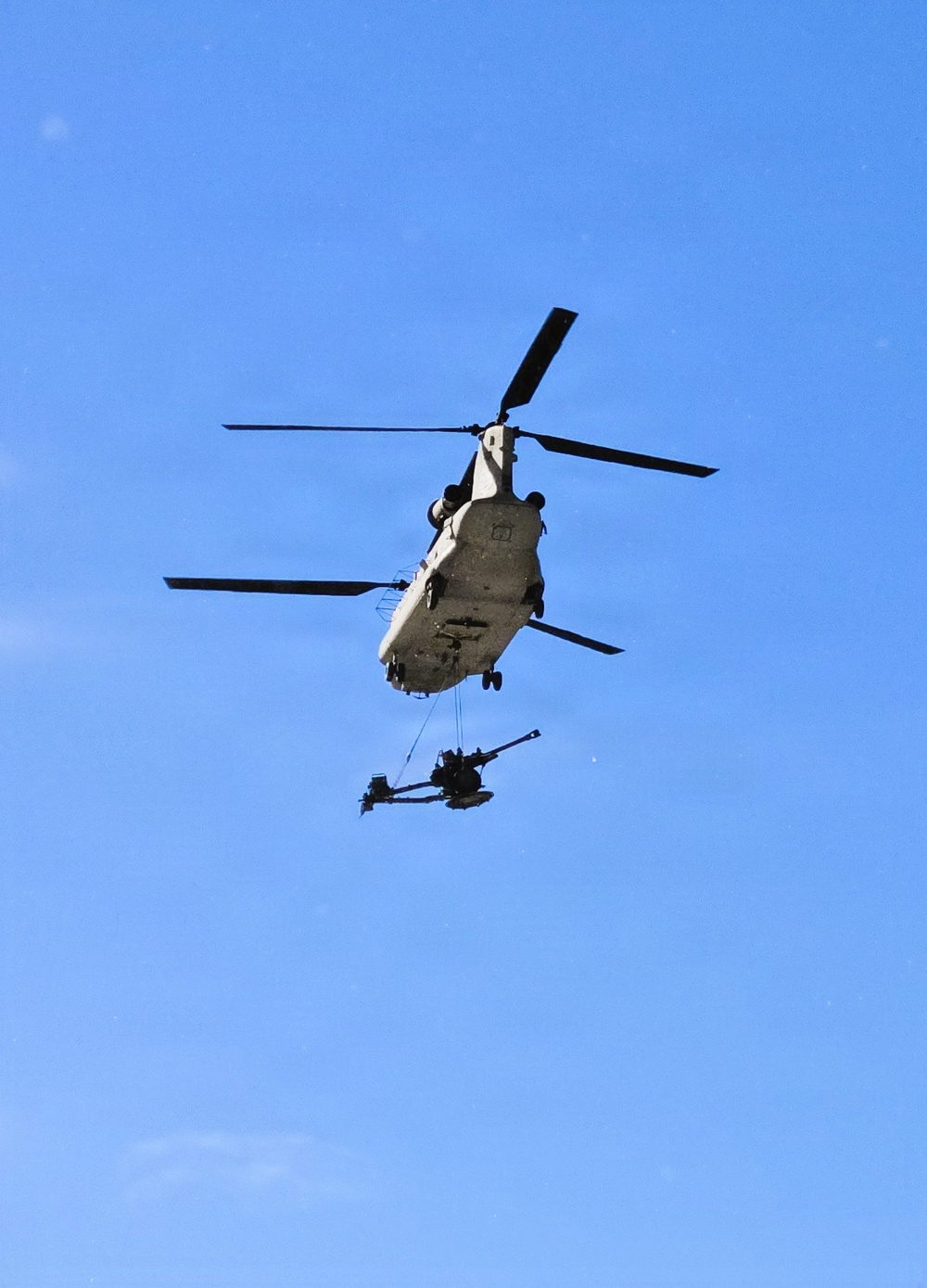 120th Field Artillery Soldiers conduct winter sling-load ops with Black Hawk, Chinook helicopters