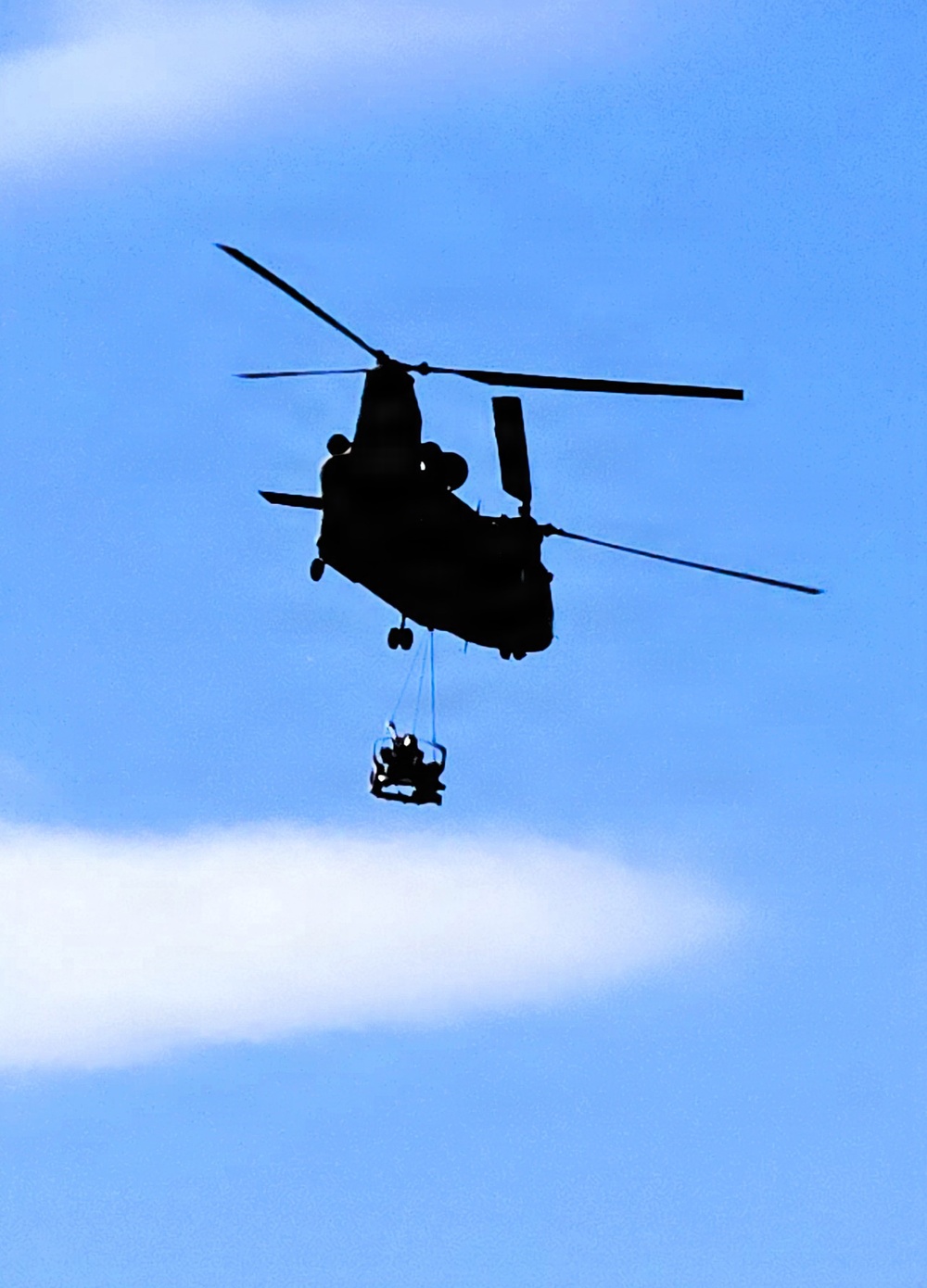 120th Field Artillery Soldiers conduct winter sling-load ops with Black Hawk, Chinook helicopters