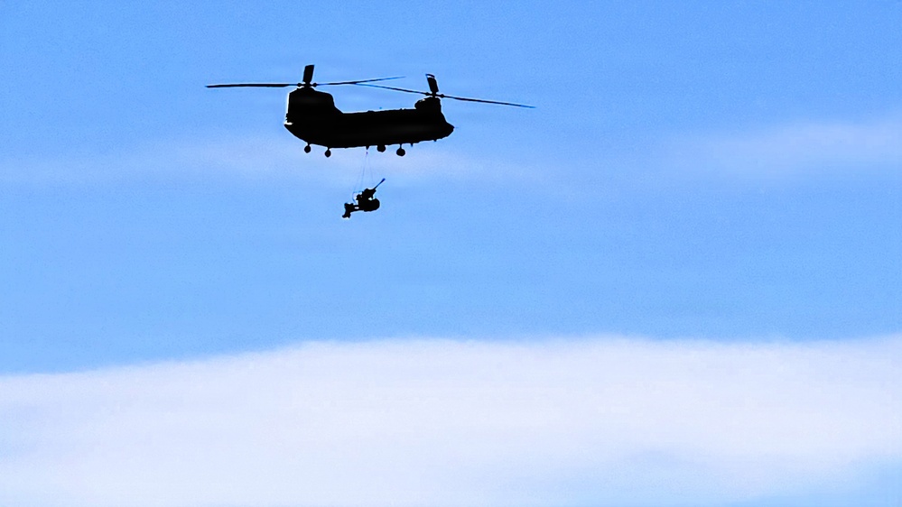 120th Field Artillery Soldiers conduct winter sling-load ops with Black Hawk, Chinook helicopters