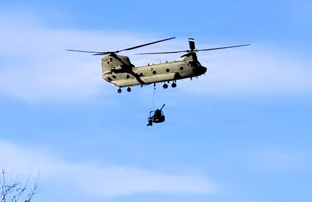 120th Field Artillery Soldiers conduct winter sling-load ops with Black Hawk, Chinook helicopters