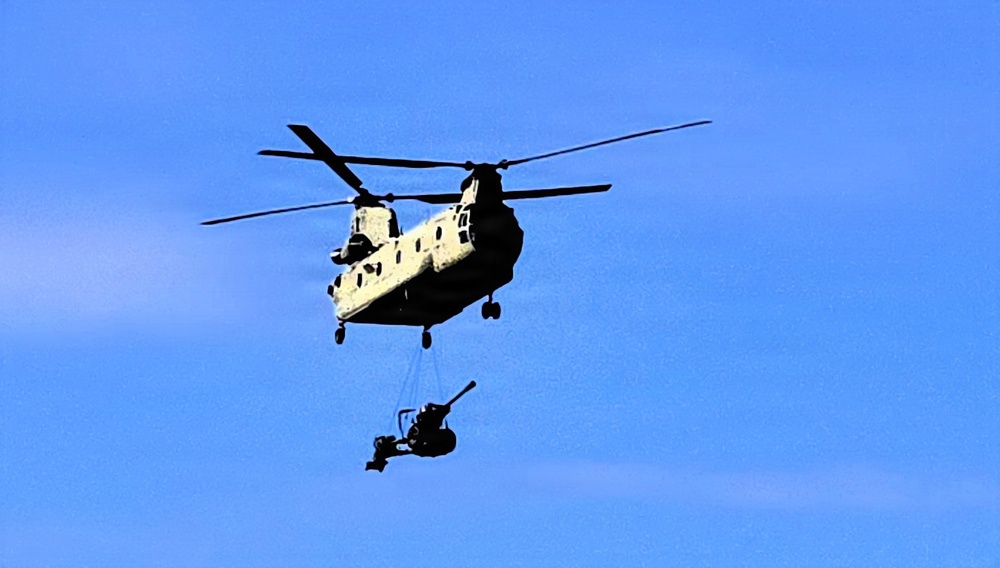 120th Field Artillery Soldiers conduct winter sling-load ops with Black Hawk, Chinook helicopters