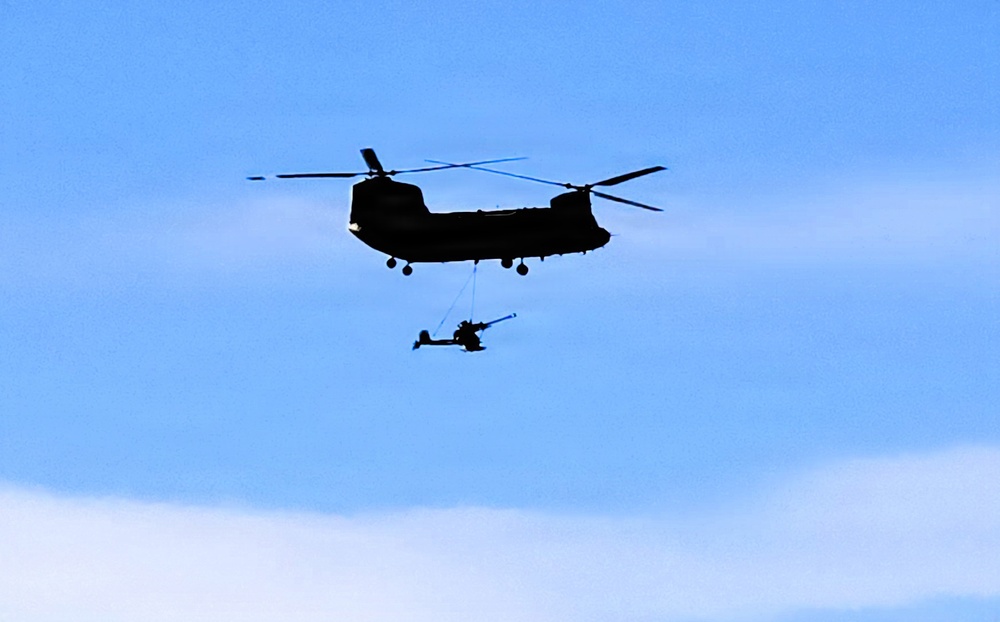 120th Field Artillery Soldiers conduct winter sling-load ops with Black Hawk, Chinook helicopters