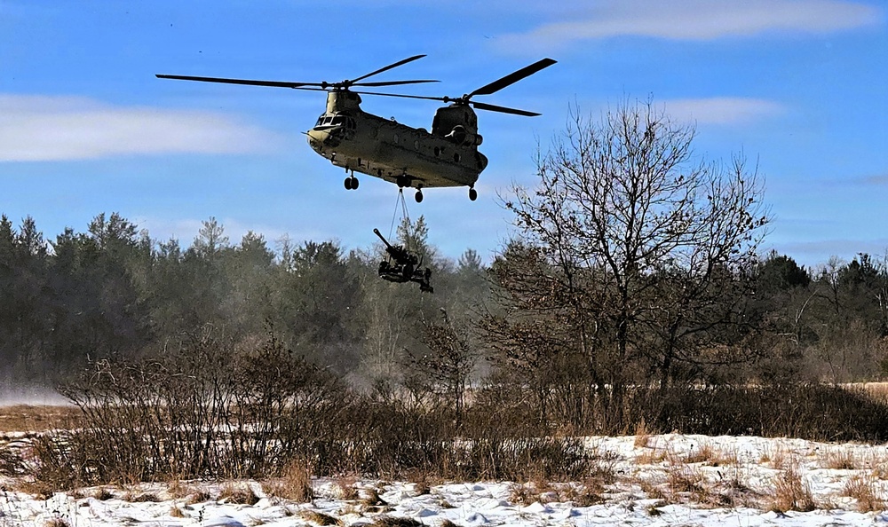 120th Field Artillery Soldiers conduct winter sling-load ops with Black Hawk, Chinook helicopters